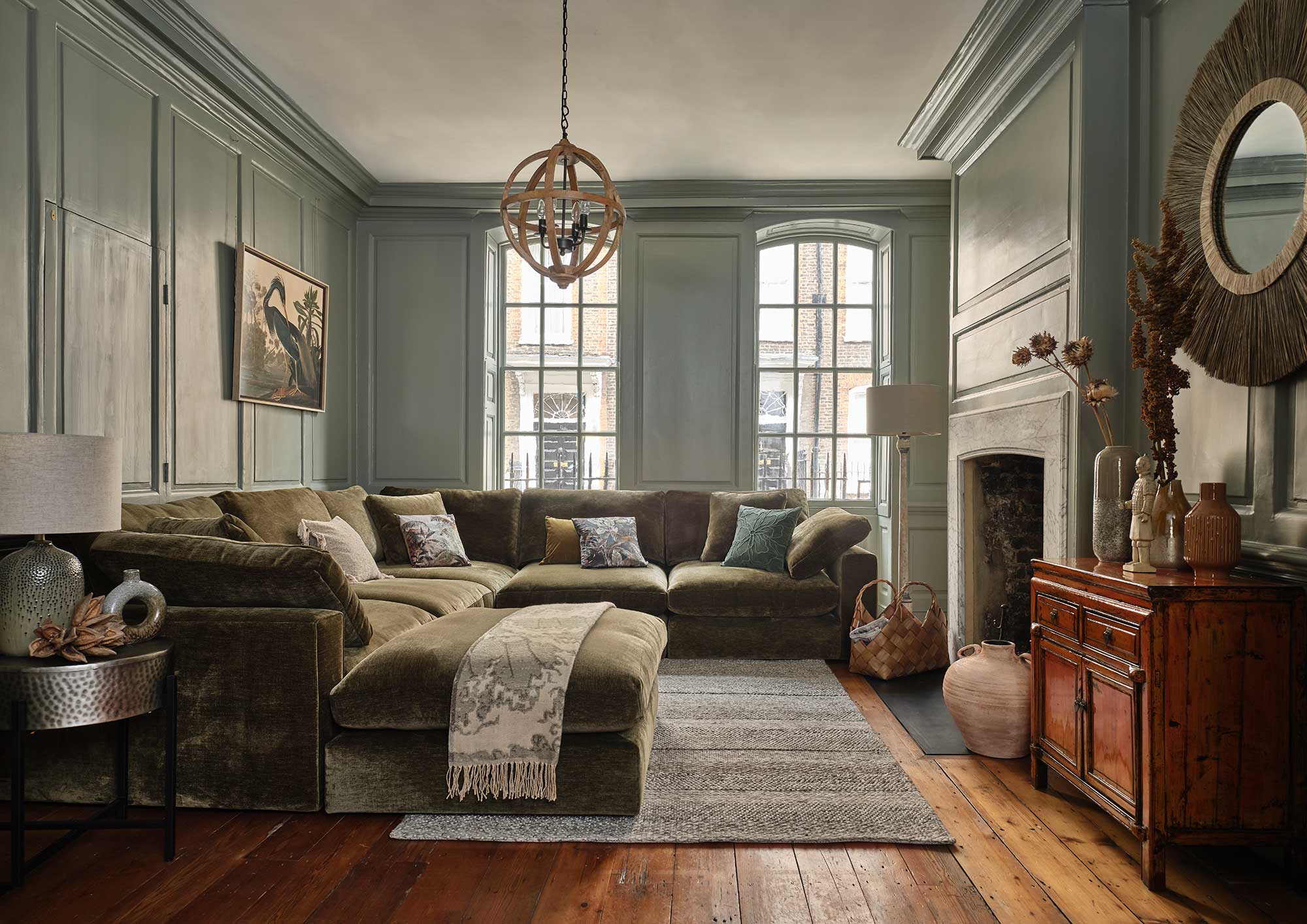 Living room with dark green sofa discount