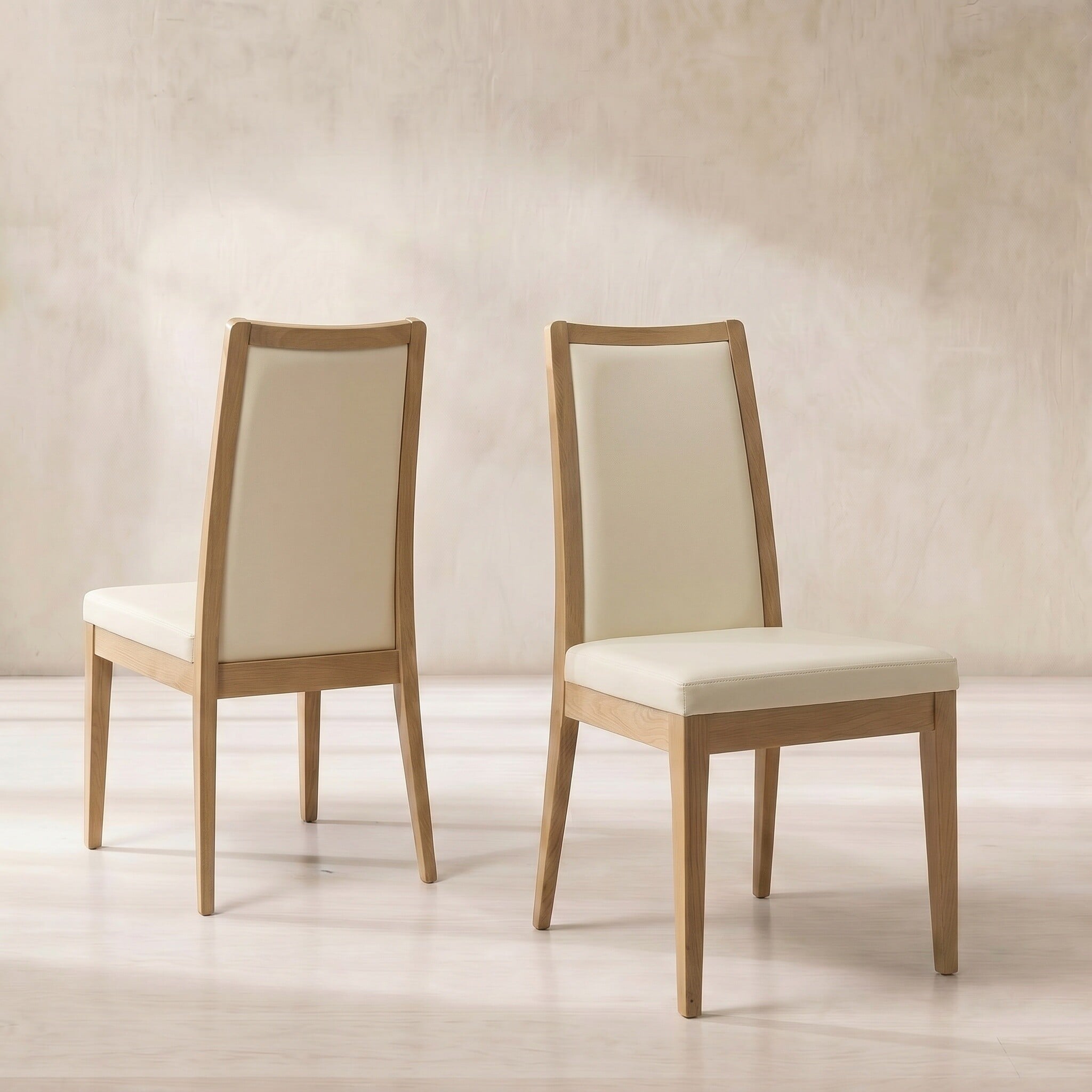 Ercol romana padded back dining chair in neutral leather