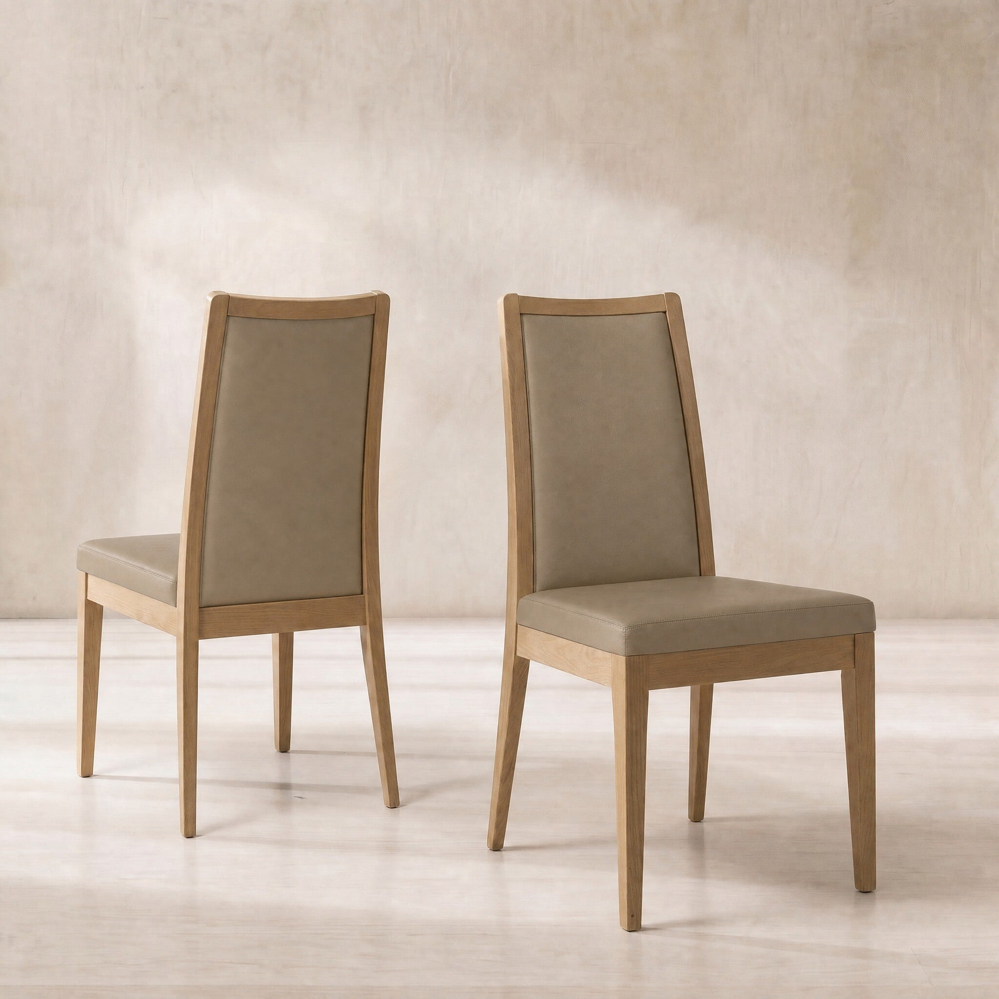 Ercol romana padded back dining chair in brown leather