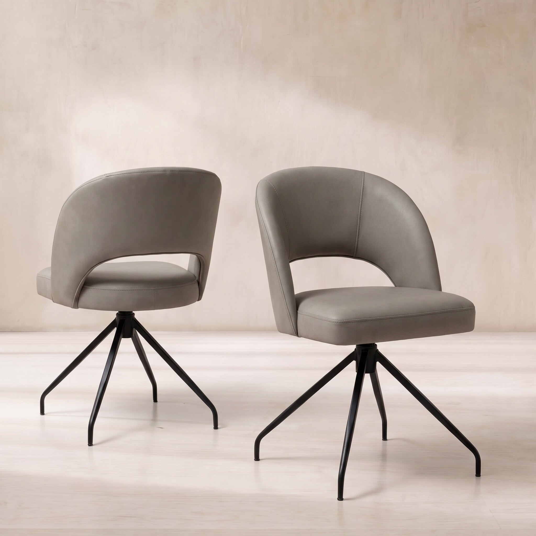 Pure furniture beck swivel dining chair with curved metal legs in grey leather