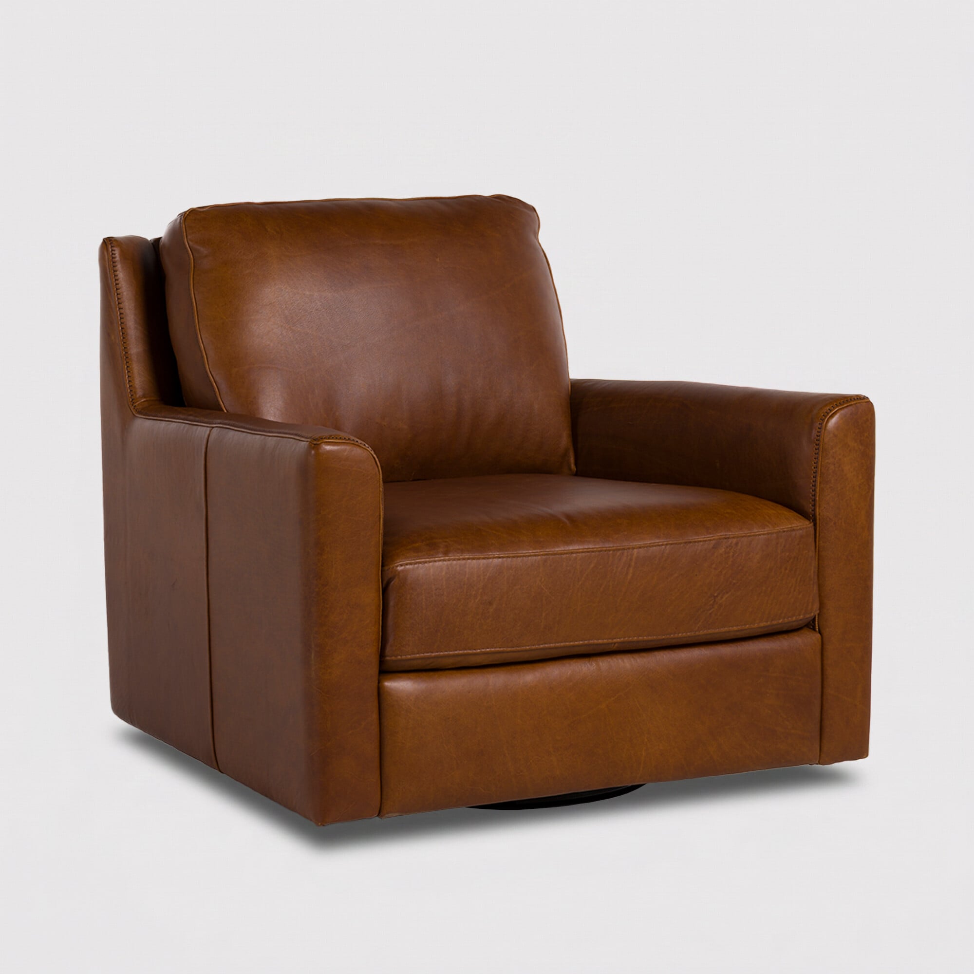 Albard swivel armchair in brown leather