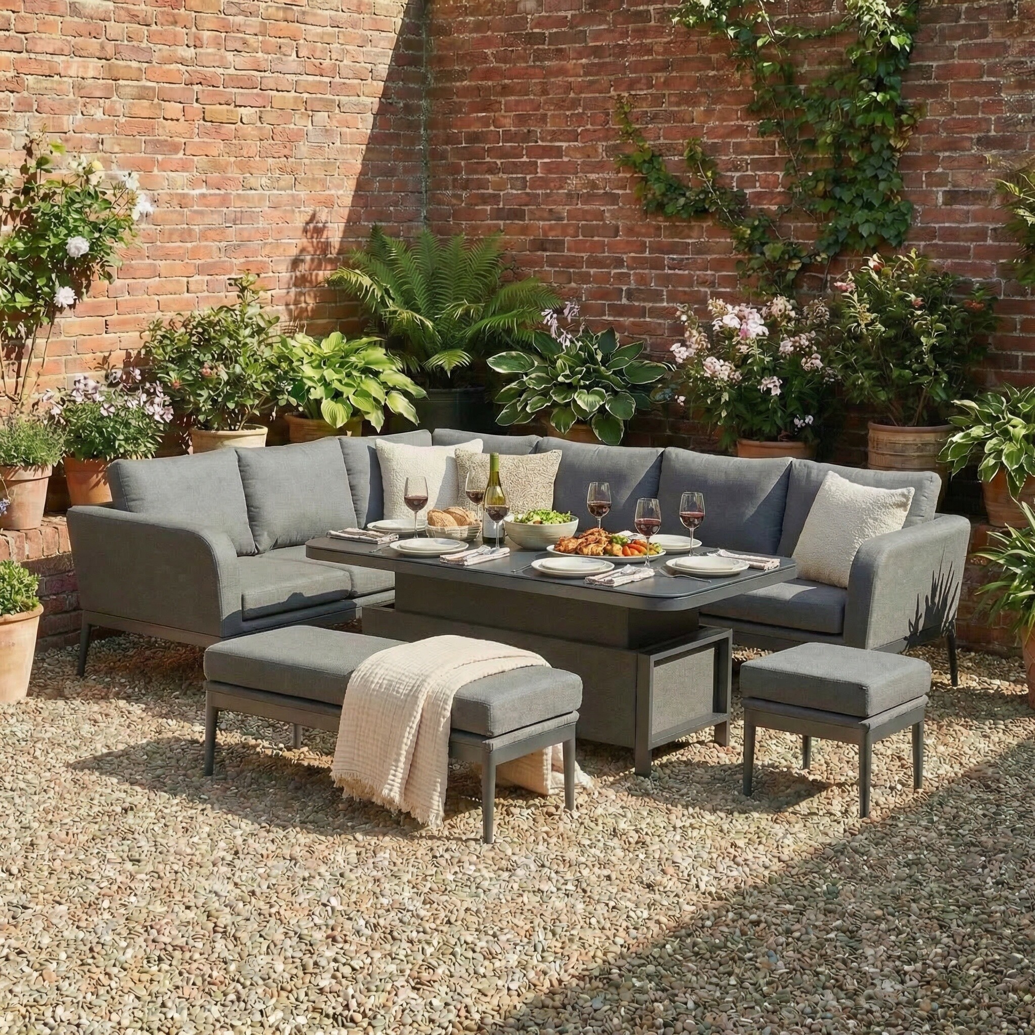 Photo of canzo corner sofa set in with rising table in aluminium in grey