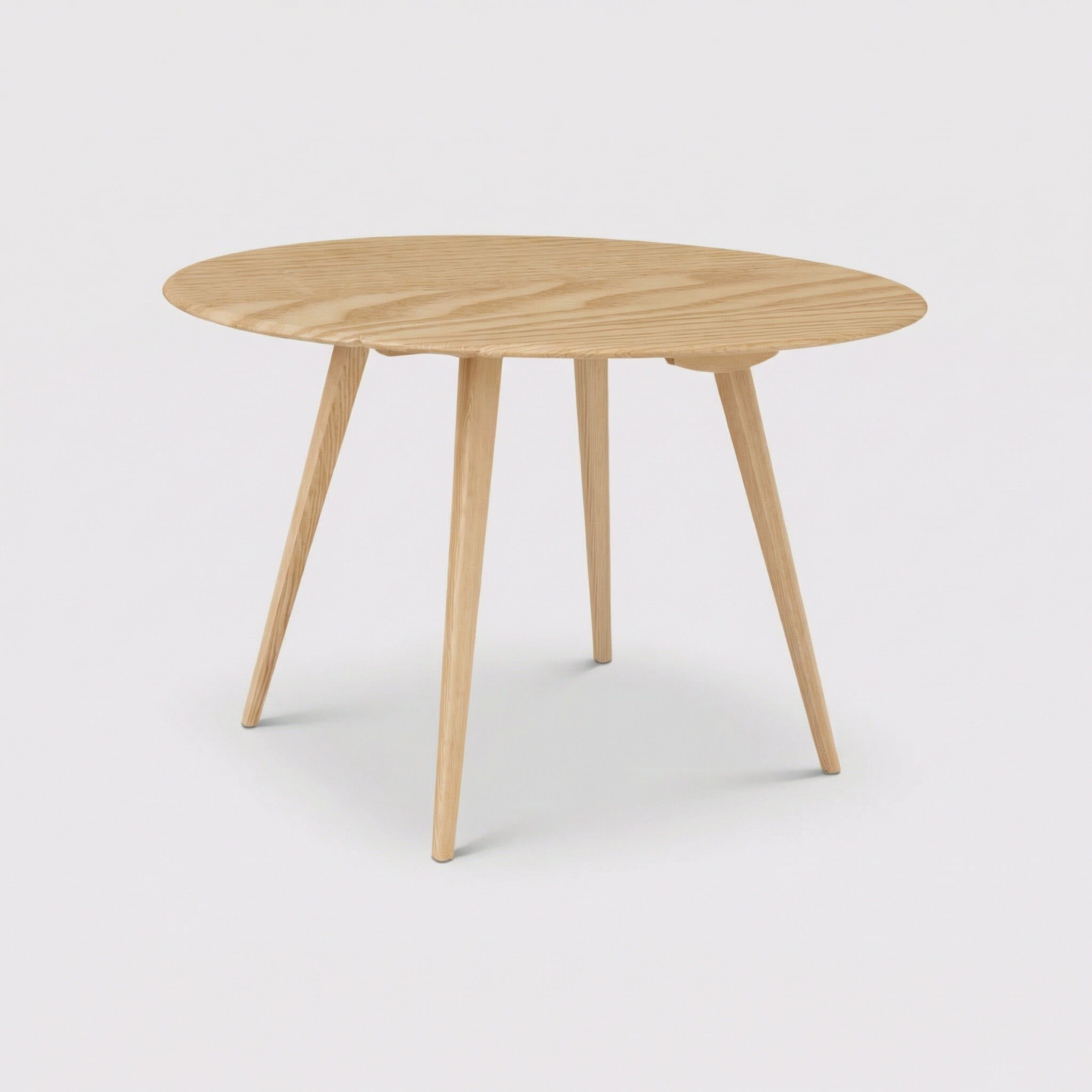 Ercol drop leaf table in round wood