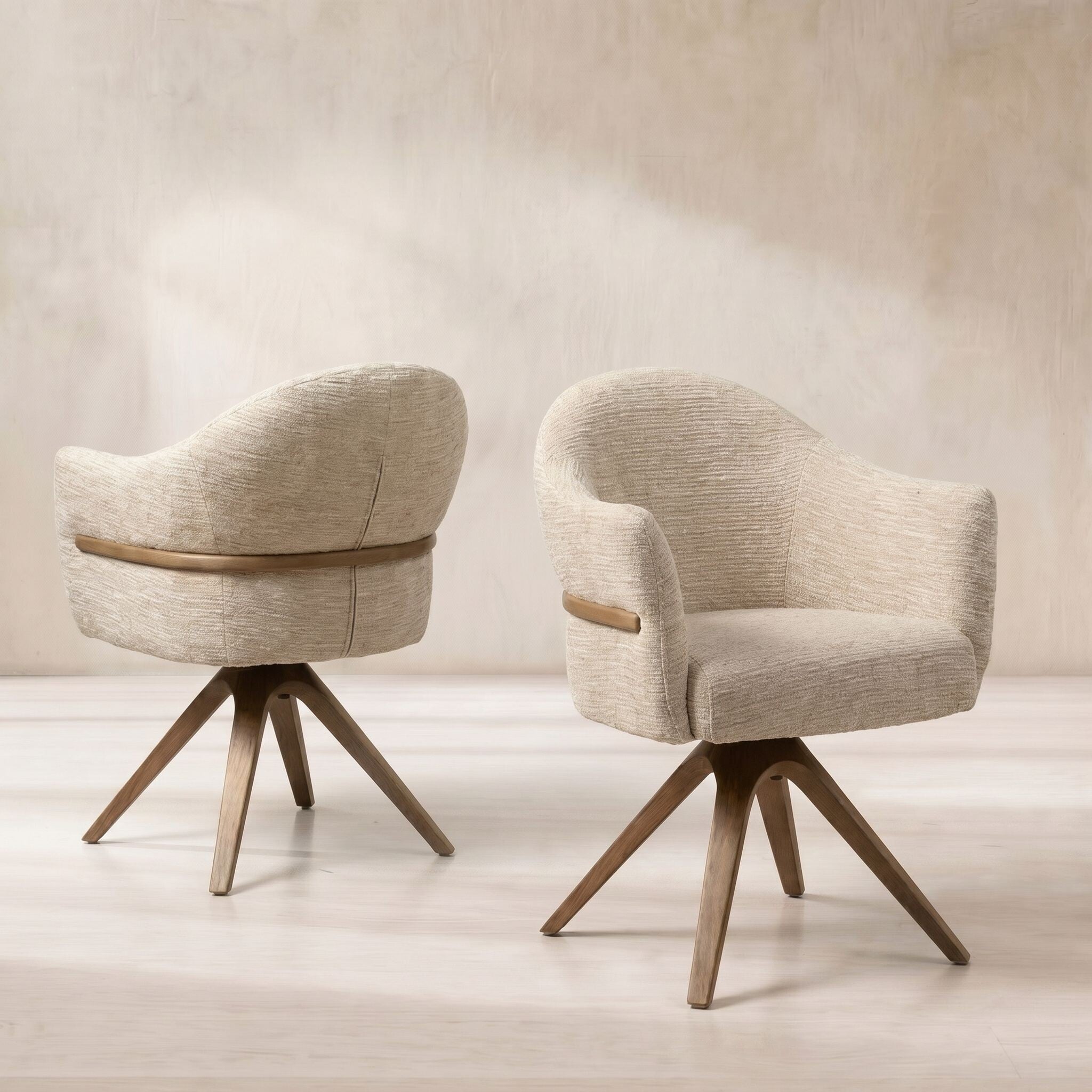 Fitzgerald swivel dining chair with arms in neutral fabric