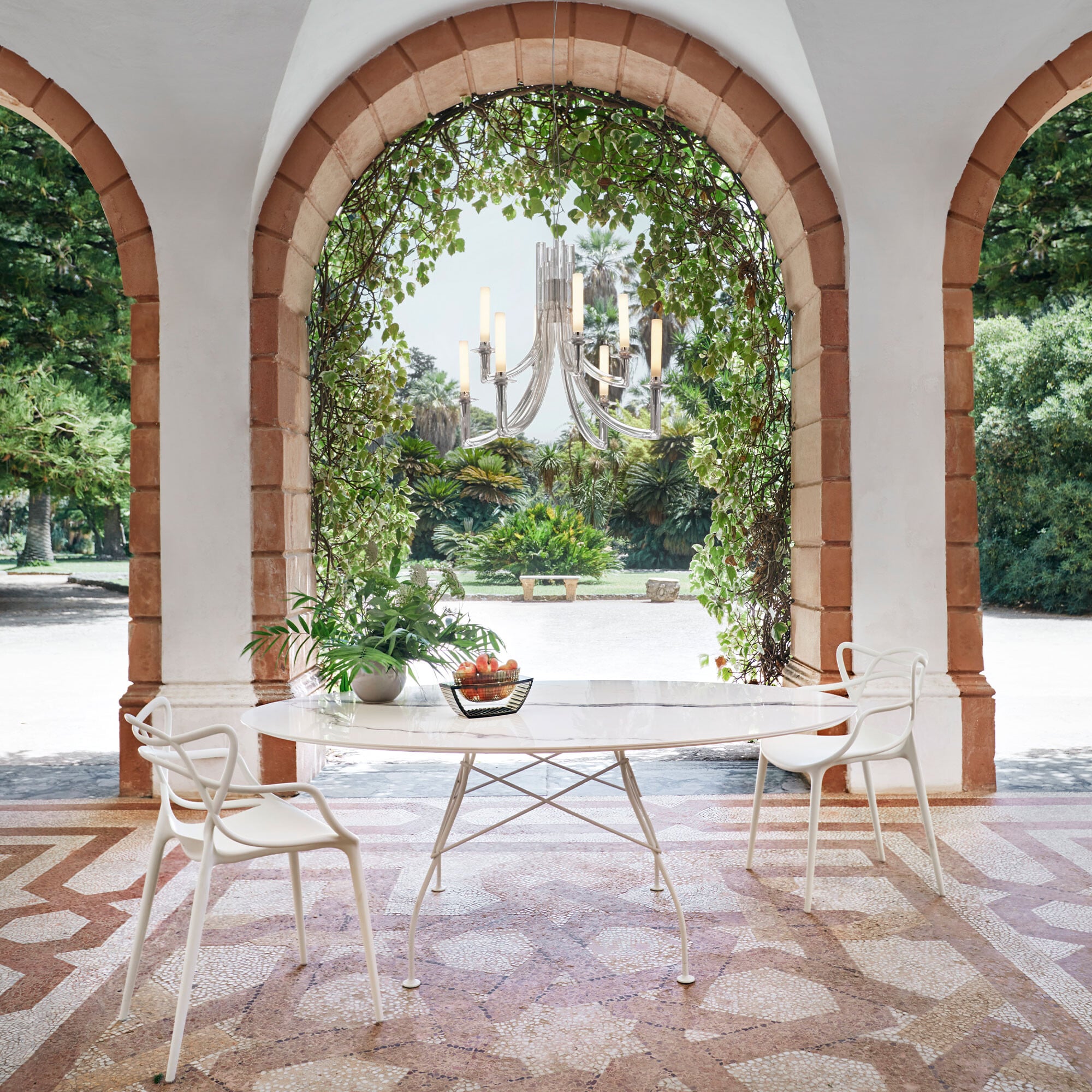 View Kartell glossy 128cm round dining table in round in white stone View Kartell glossy 128cm round dining table in round in white stone