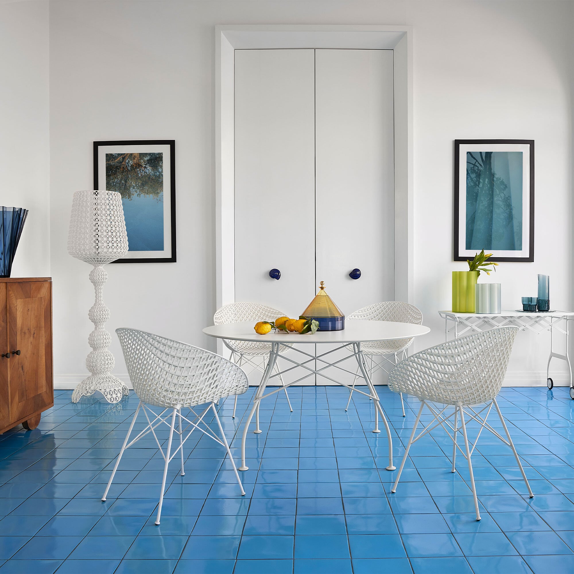 View Kartell glossy 128cm round dining table in round in white stone View Kartell glossy 128cm round dining table in round in white stone