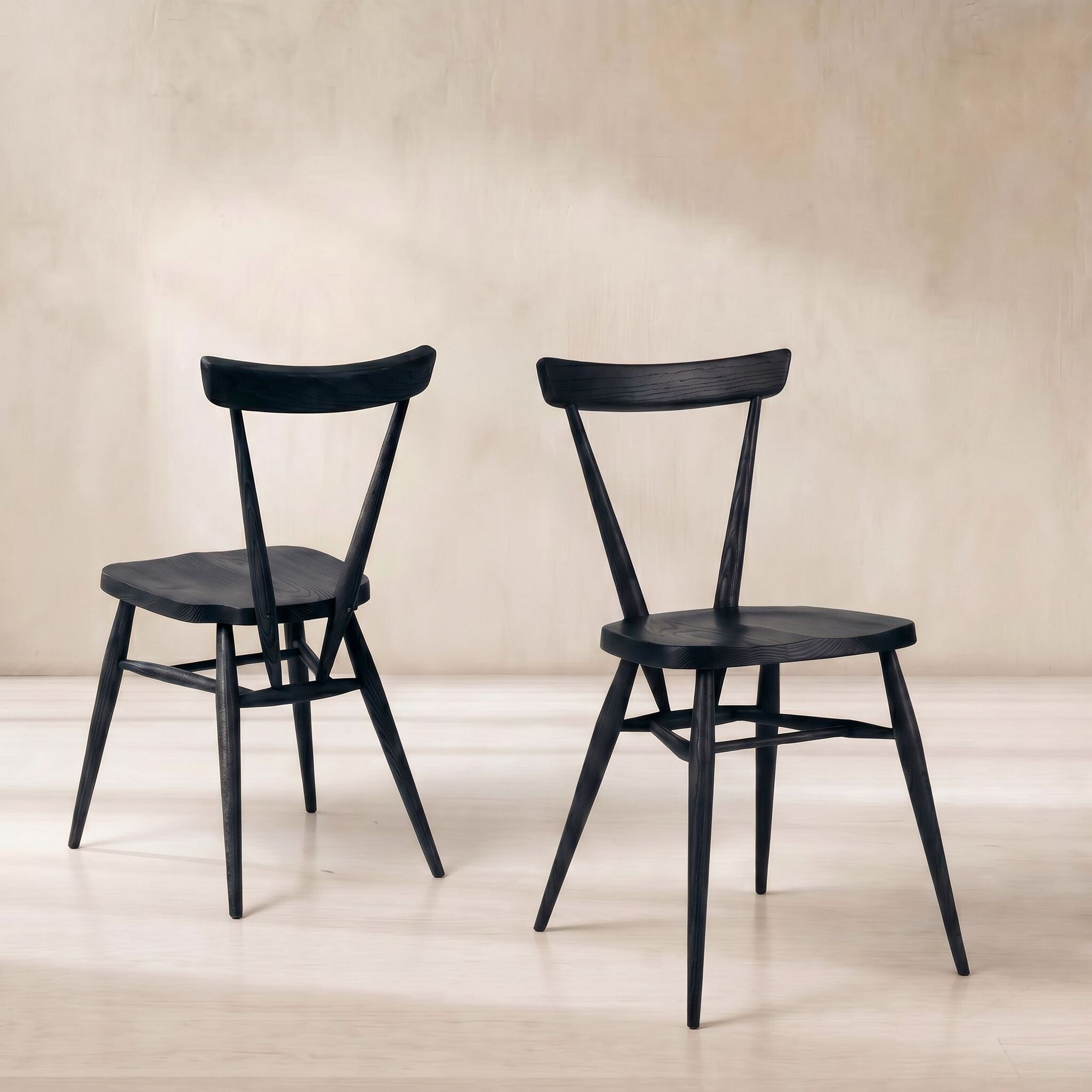 Ercol stacking dining chair in black wood
