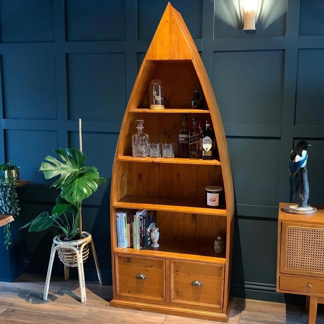 Boat shaped bookcase deals