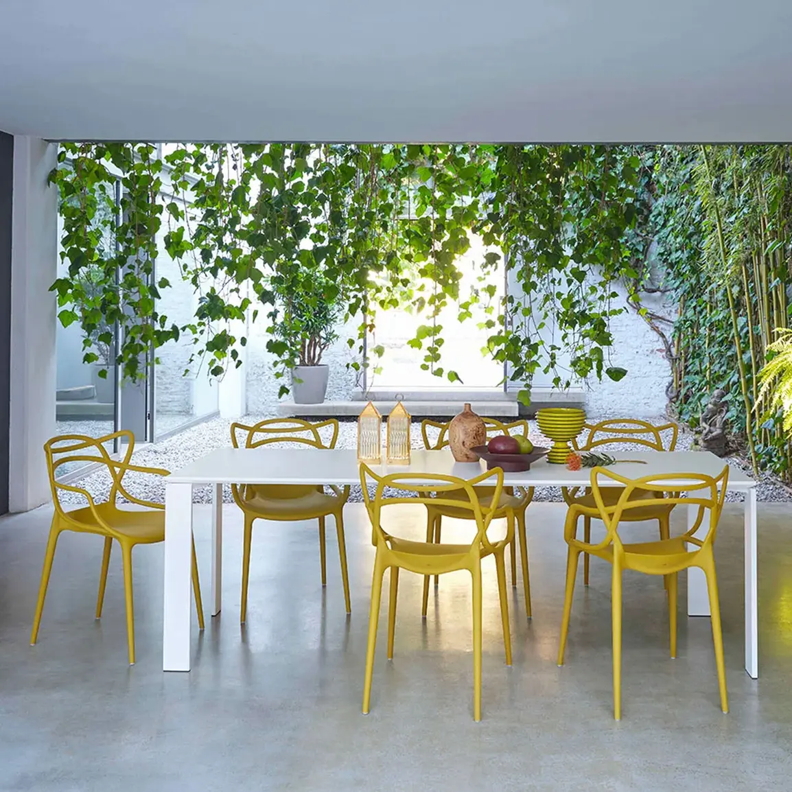 Kartell イエローチェア モダンデザイン Kartell Masters Mustard Yellow Open Back Sculpted Dining Chair