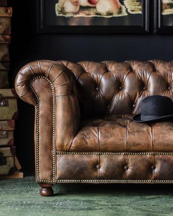 Brown leather couch with buttons discount