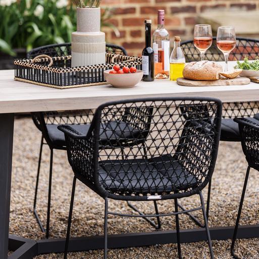 Black woven outdoor dining shop chair